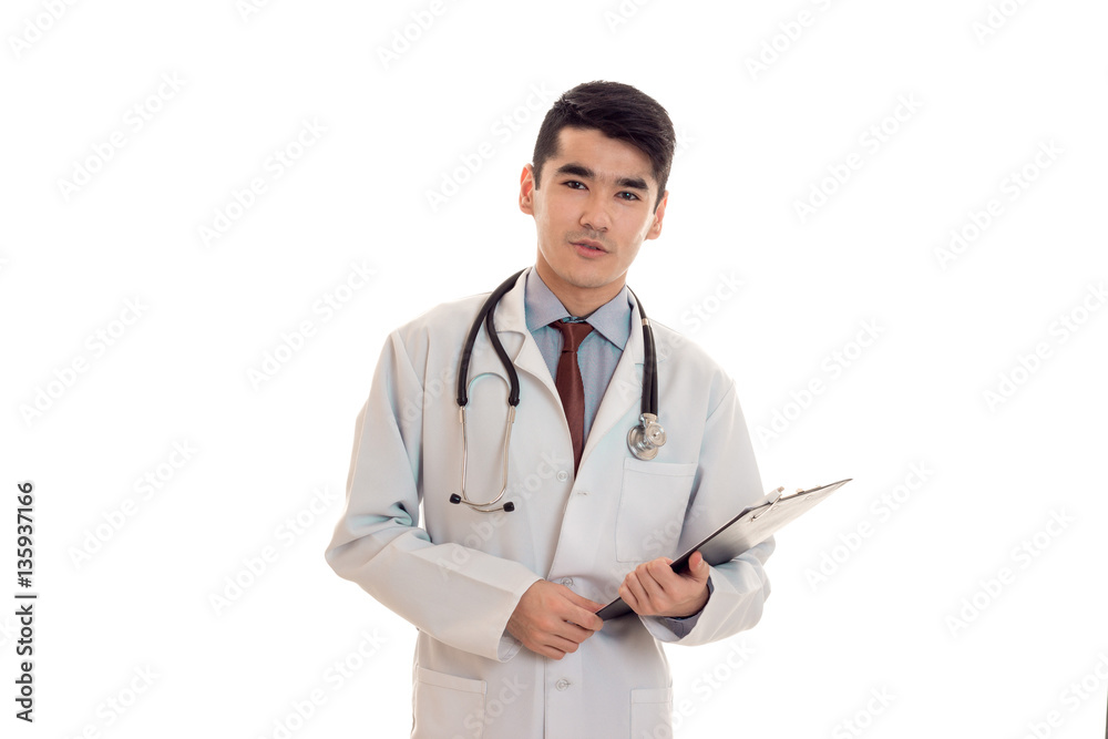 studio portrait of beauty male doctor in uniform posing isolated on white background studio portrait of beauty male doctor in uniform posing isolated on white background