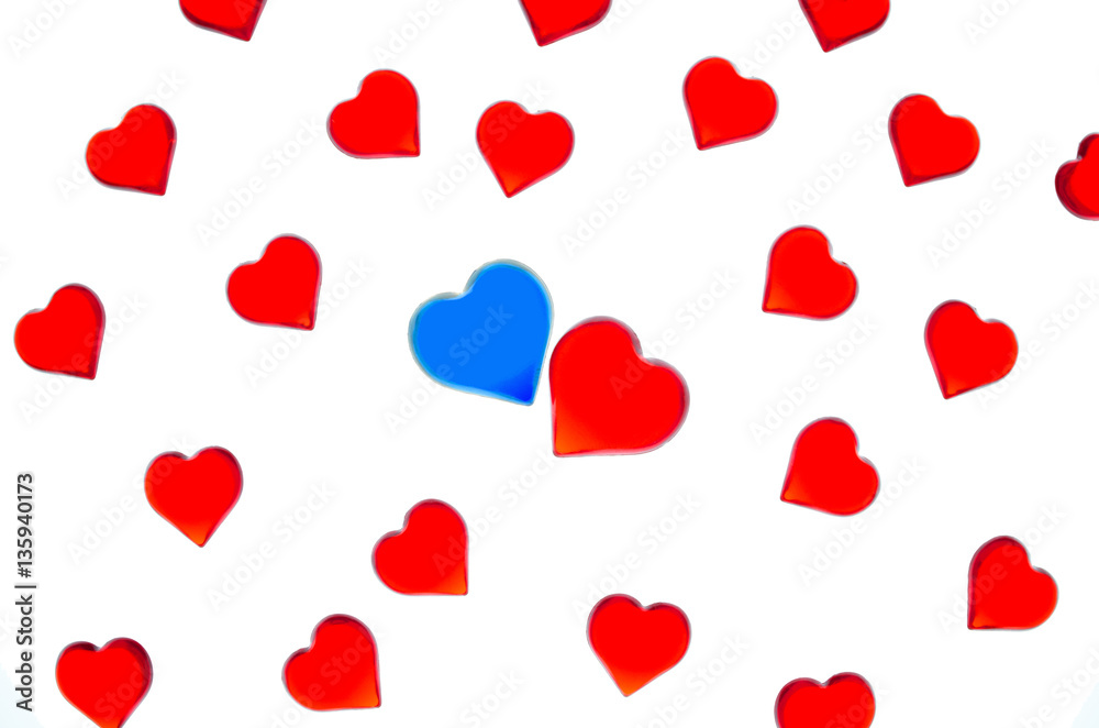 Bright red hearts on a striped background with blue and red hearts. In order to use Valentine's Day, weddings, International Women's Day