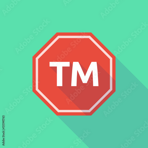 Long shadow stop signal with    the text TM