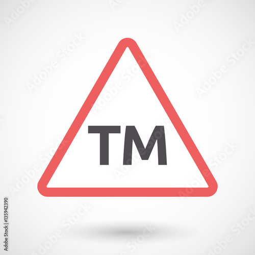 Isolated warning signal with    the text TM