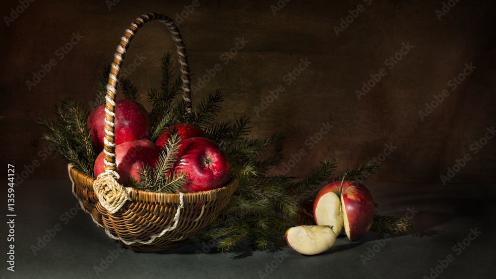still life of apples in the branches of fir