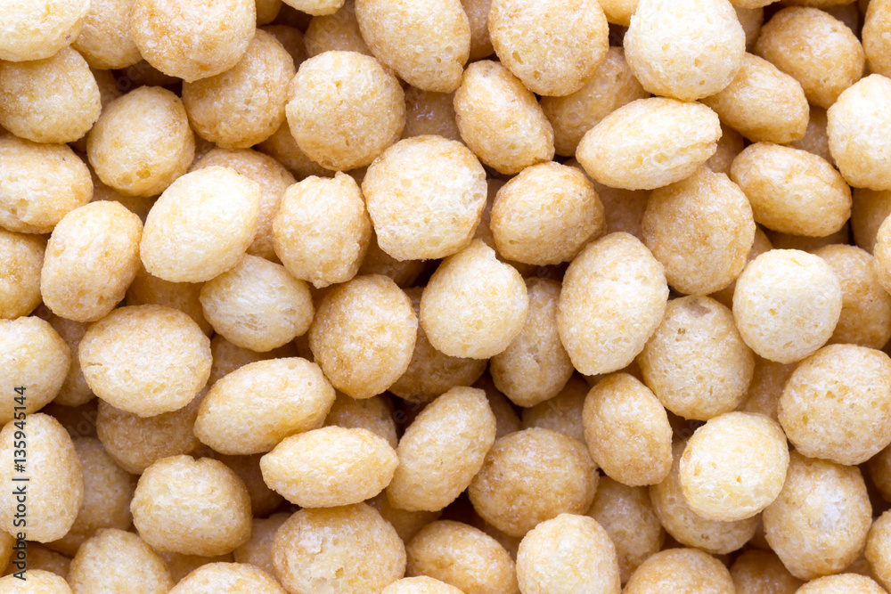 Corn flakes rings on the background. Corn flakes rings on the background.
