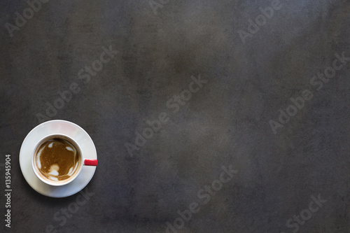 Hot cappuccino in cup top view background