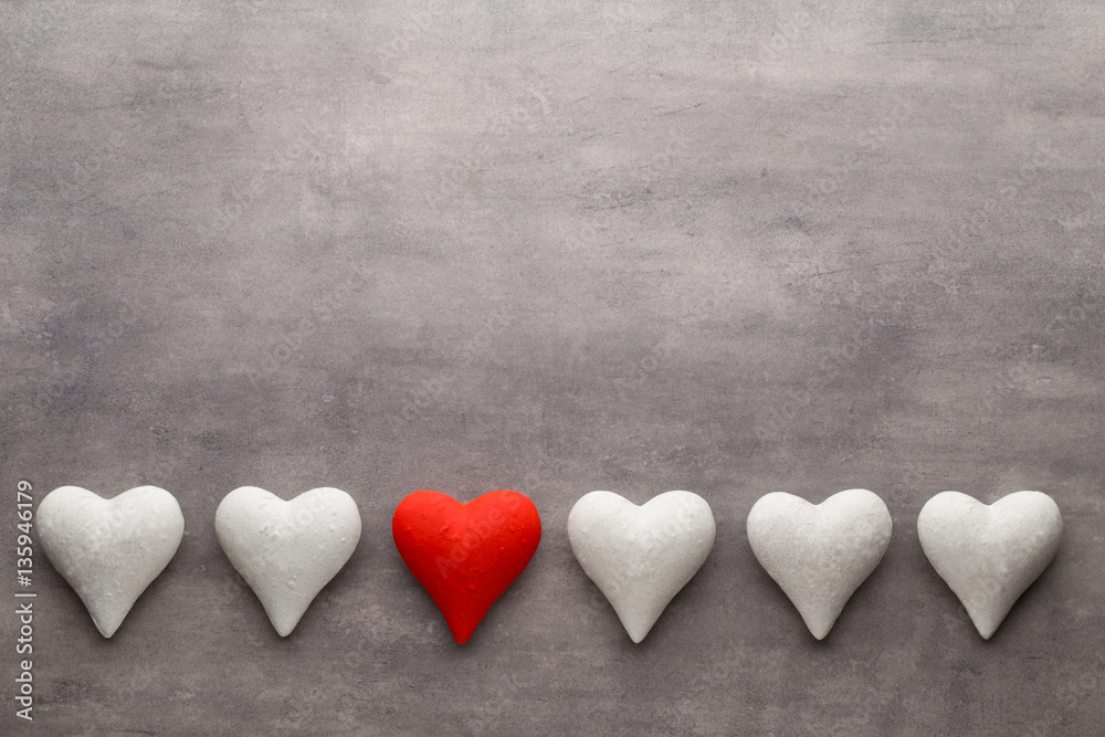 Red hearts on the gray background. Valentine Day background. Red hearts on the gray background. Valentine Day background.