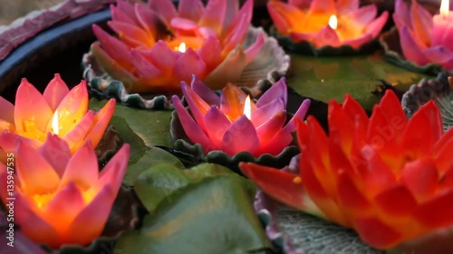 lotus candles for worshiping Gods and bringing luck in the temple, Lotus candles for decoration home, Camera pan left to right