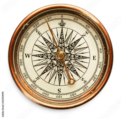 Vintage compass close up isolated on white background