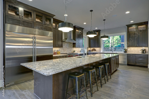 Modern kitchen with brown kitchen cabinets
