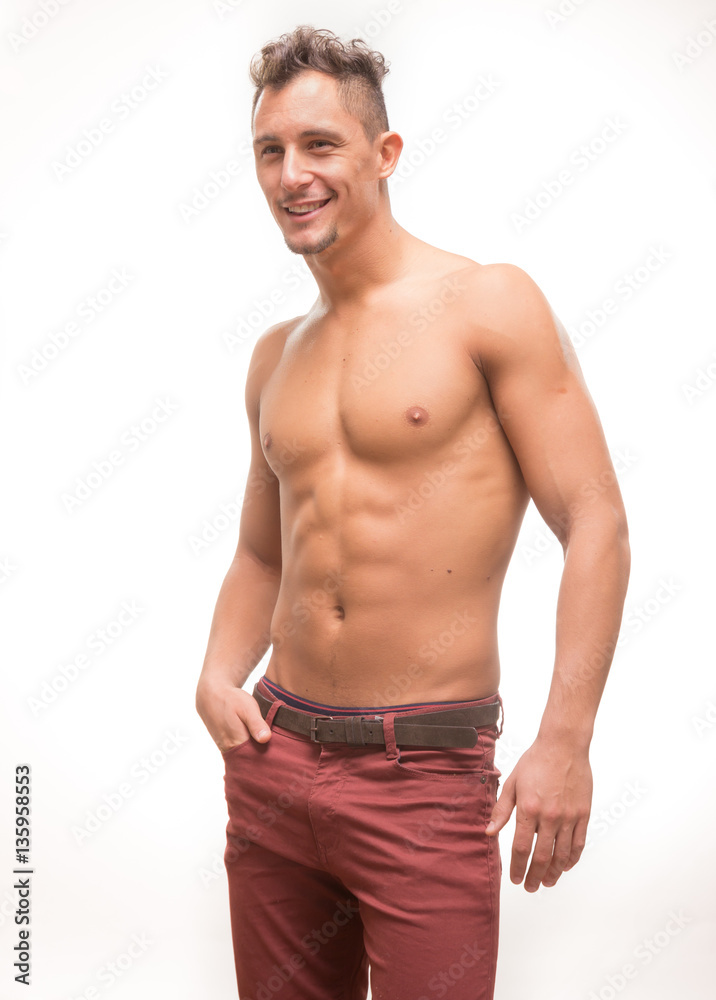 young man shirtless pants body muscular model smiling