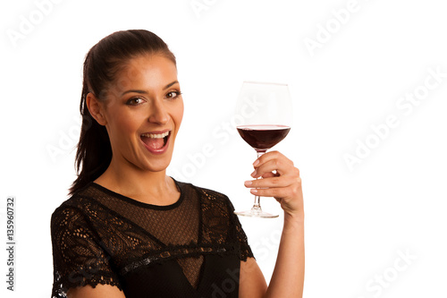 Elegant woman with a glass of red wine