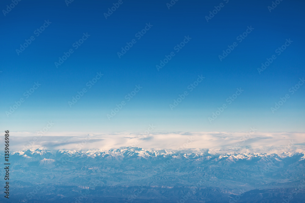 Flying above the clouds. view from the airplane, soft focus Flying above the clouds. view from the airplane, soft focus