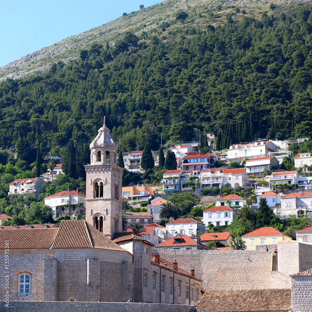 Dominican monastery and bell tower, landmark in Dubrovnik, Croatia. Old Town Dubrovnik is popular tourist destination and UNESCO World Heritage Site. 