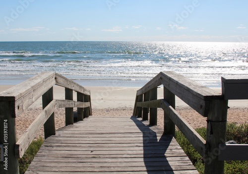 The walkway pier leading down to the beach. © Al