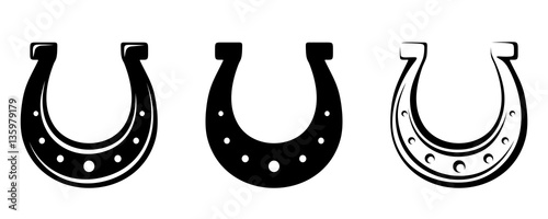 Obraz na plátně Set of three vector black silhouettes of horseshoes isolated on a white background