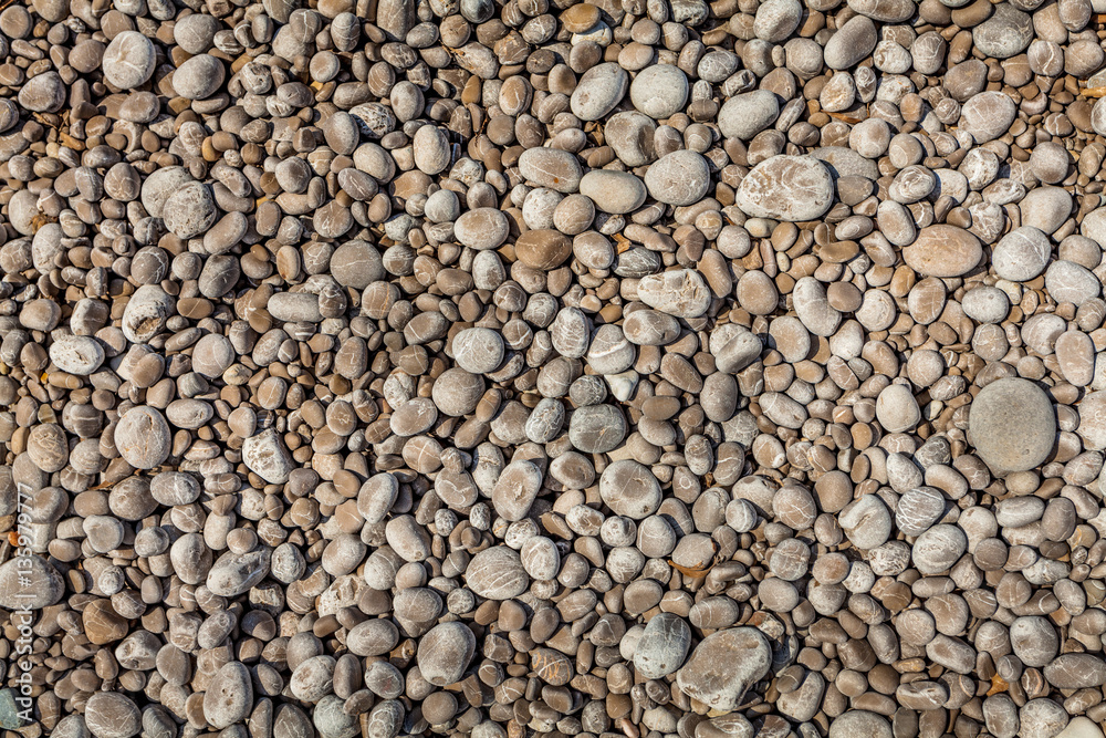 Mediterranean sea washes polished stones on seashore Mediterranean sea washes polished stones on seashore