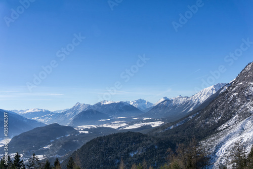 Winter mountains landscape track and blue sky in sunny day. Tirol  Austria