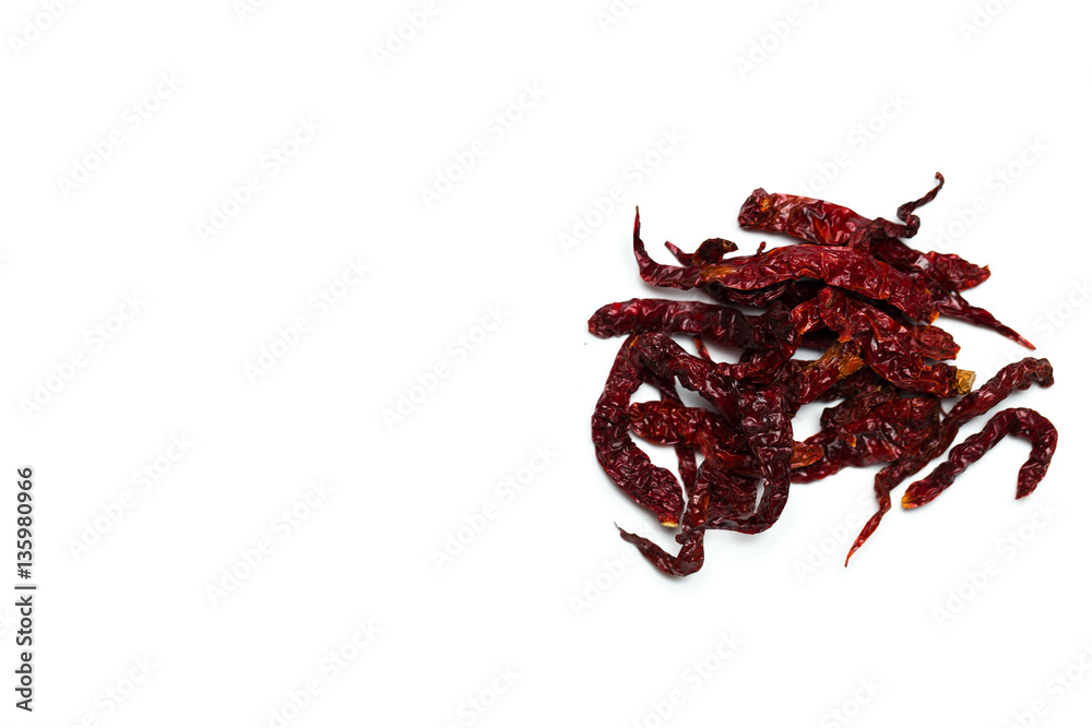 Fototapeta premium A dried chillies lay flat isolated over white background