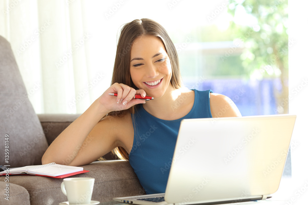 Entrepreneur working at home with a laptop