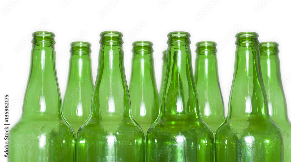 Row of open empty green bottles isolated on white background Row of open empty green bottles isolated on white background