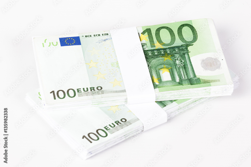 Stacks of 100 Euro Banknotes isolated on white background Stacks of 100 Euro Banknotes isolated on white background