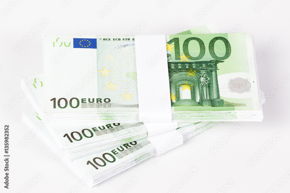 Stacks of 100 Euro Banknotes isolated on white background Stacks of 100 Euro Banknotes isolated on white background