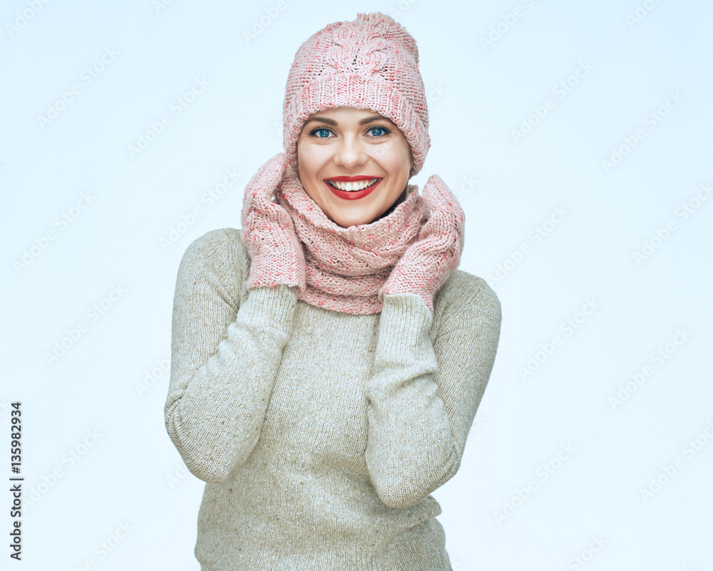 Happy smiling woman wearing winter warm clothes isolated portrai Happy smiling woman wearing winter warm clothes isolated portrai