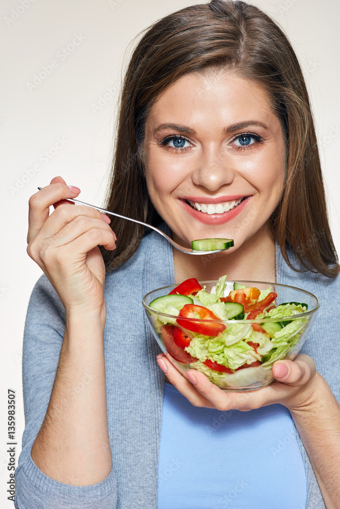 Woman eating salad. Close up face portrait. Woman eating salad. Close up face portrait.