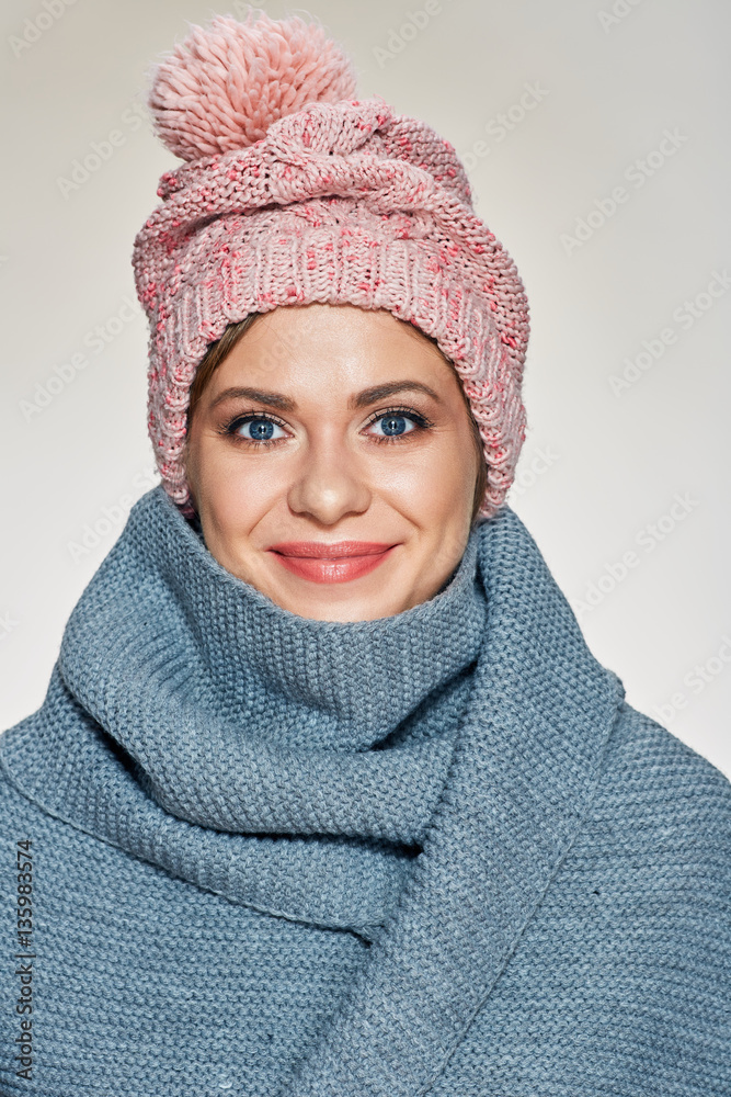 Smiling woman wearing warm winter clothes. Smiling woman wearing warm winter clothes.