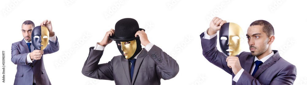 Businessman with mask in hypocrisy concept Businessman with mask in hypocrisy concept