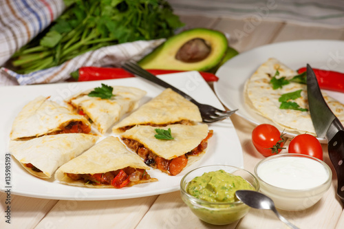 Quesadilla with chicken, served with guacamole or salsa sauce