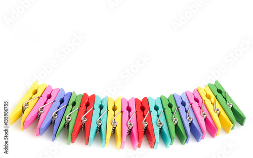 Group colorful clothespin on white background