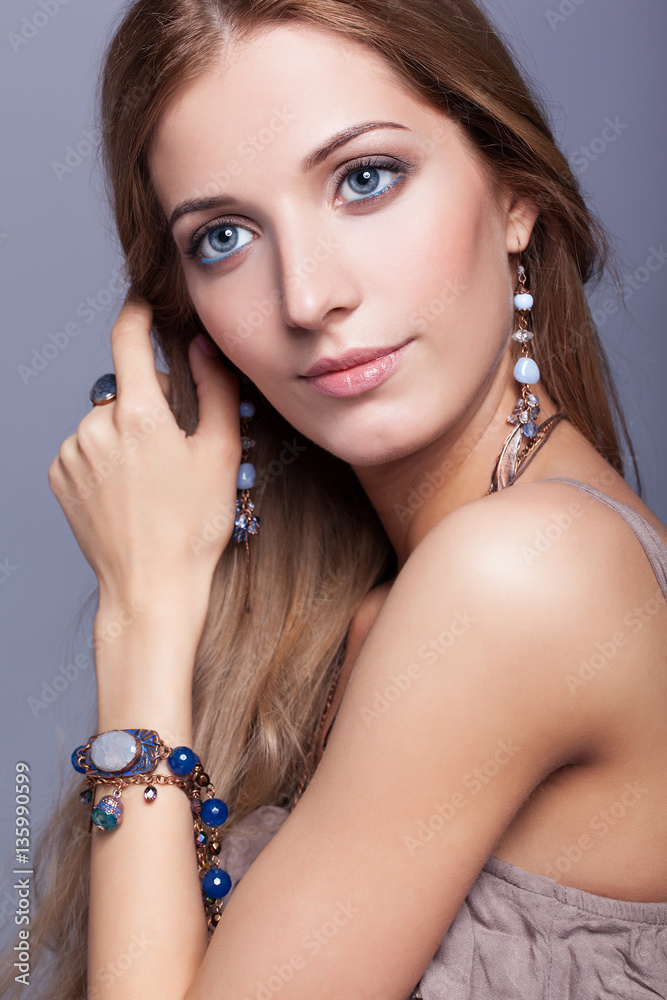 Beautiful woman in jewelry and  bijouterie