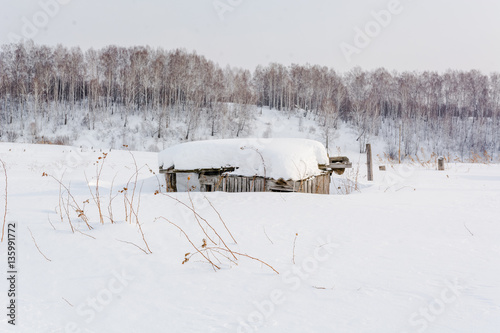 The abandoned house under snow. The house in which not who doesn't live in the winter.