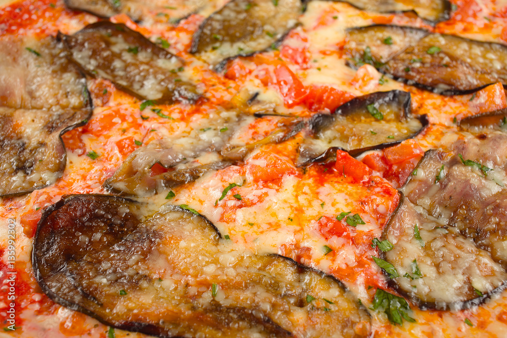 vegetable pizza with eggplant closeup macro view vegetable pizza with eggplant closeup macro view