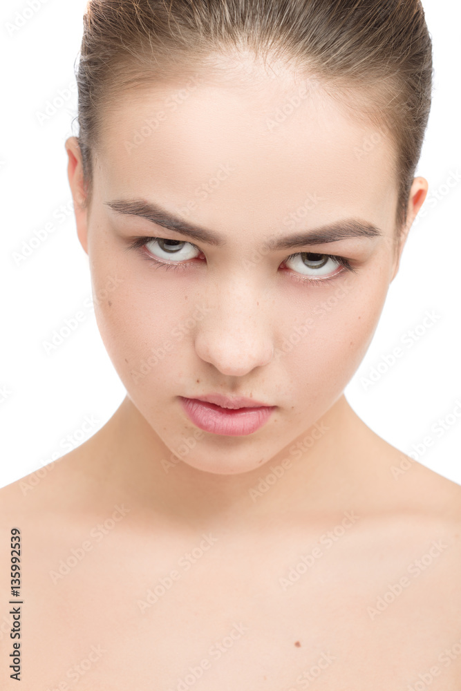 Woman with a natural beauty makeup look isolated over a white background with copyspace Woman with a natural beauty makeup look isolated over a white background with copyspace