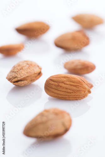 Almonds nut with shell isolated on white