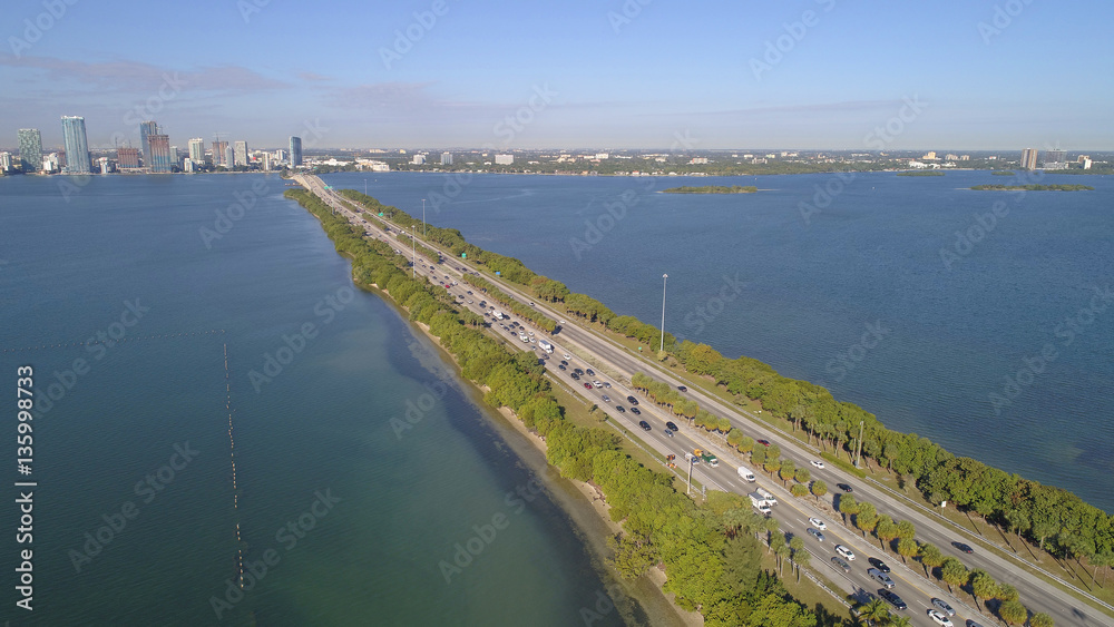 Aerial image of car traffic on the Julia Tuttle Causeway facing westbound