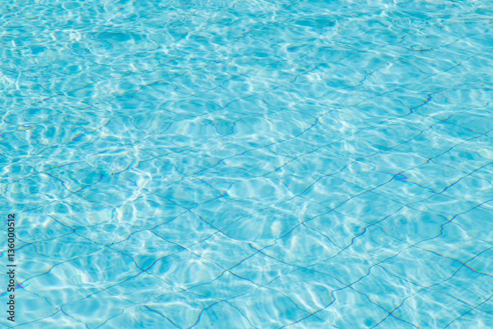 Blue ripped water in swimming pool.