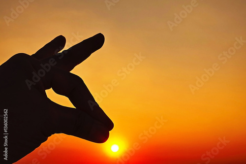 Bulur focus sunset sky and silhouette hand icon 
