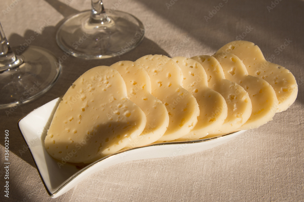 Heart shaped cheese and two glasses. Valentine's Day Heart shaped cheese and two glasses. Valentine's Day