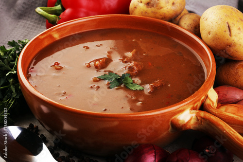 Tasty Hungarian beef goulash soup bograch close-up on the table photo