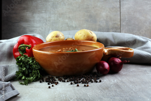 Tasty Hungarian beef goulash soup bograch close-up on the table photo