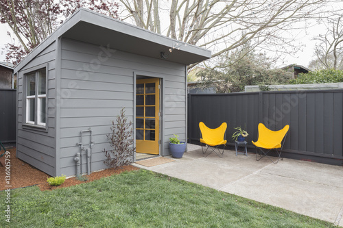 Guest House or Shed with yellow camping chairs photo