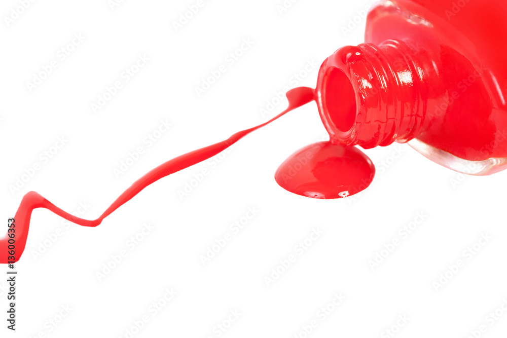 Red nail polish spilled. Isolated on white. Red nail polish spilled. Isolated on white.