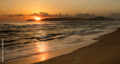 A colourful sunrise over the south China sea off the coast of Vietnam. © Paul Hampton