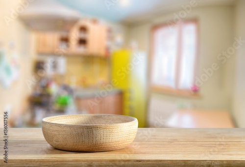 Fototapeta Naklejka Na Ścianę i Meble -  Wooden bowl on the kitchen table