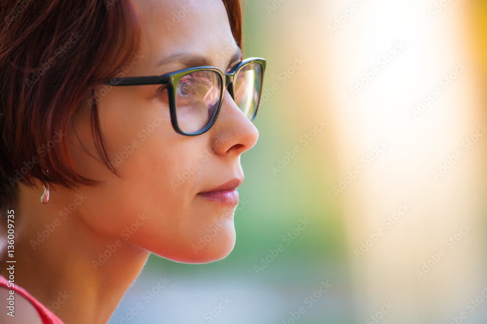 Portrait of a woman wearing glasses. Portrait of a woman wearing glasses.