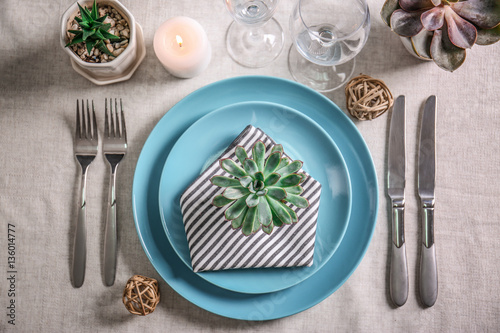 Table served with succulents for dinner