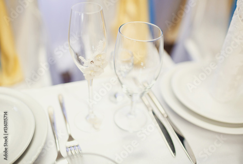 Two clean glasses on the wedding table © myronovychoksana