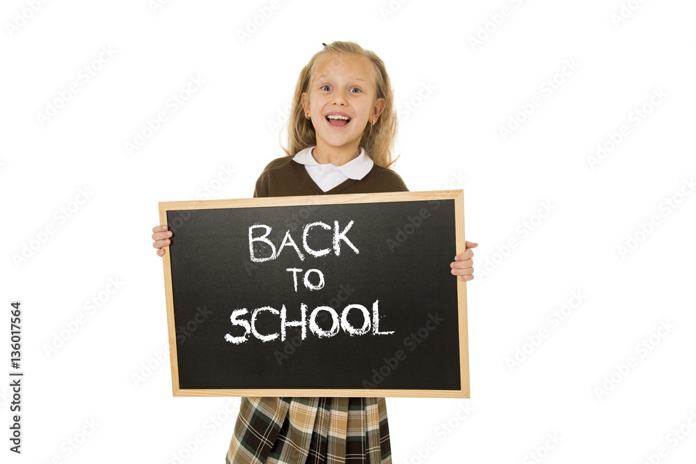 schoolgirl smiling happy holding and showing small blackboard with text back to school schoolgirl smiling happy holding and showing small blackboard with text back to school