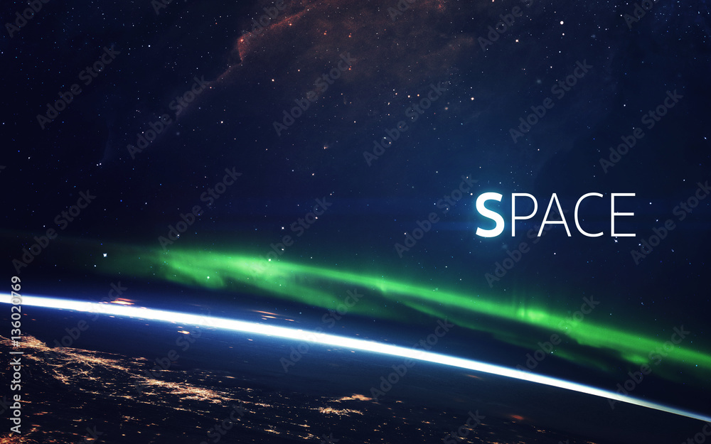 Obraz premium Natural phenomenon of Northern Lights (Aurora Borealis) related to the earth's magnetic field. Elements of this image furnished by NASA